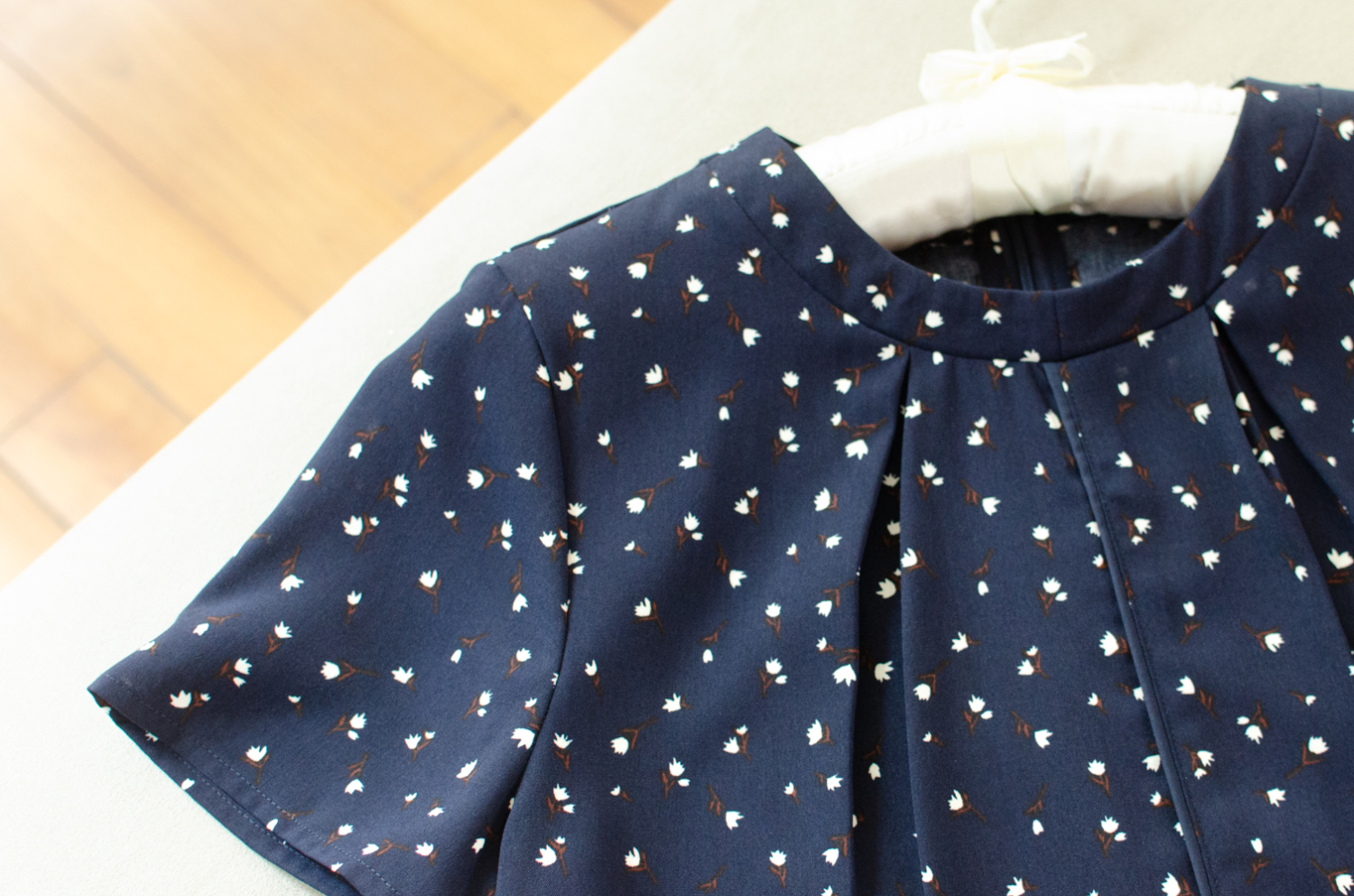 NT1714 Round Neck Folded Front Floral Blouse – Navy Blue - Image 2
