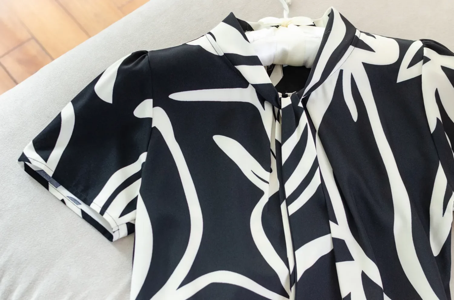 NT2429 Tie-Neck Graphic Blouse – Licorice Black - Image 5
