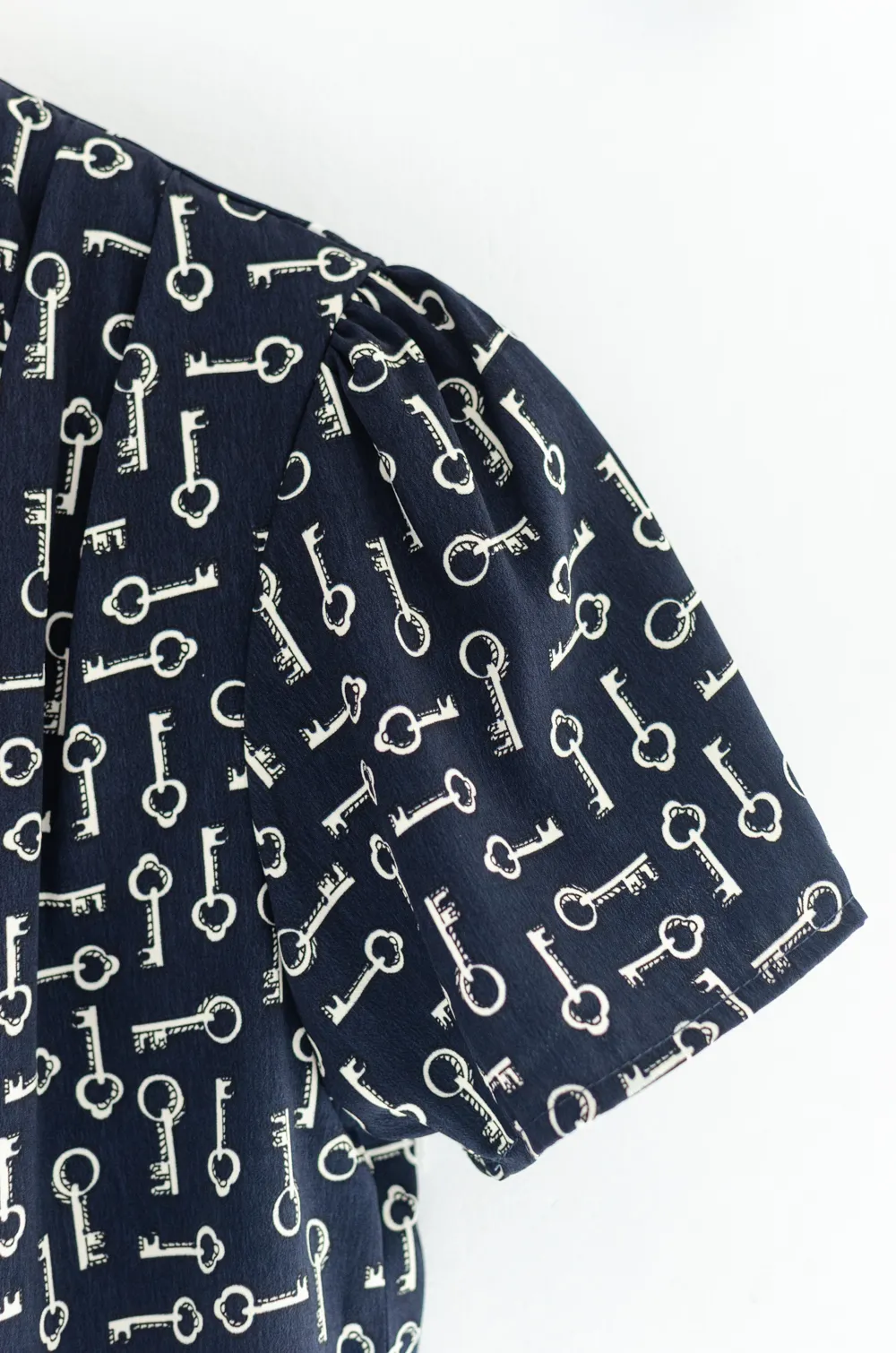 MT0601 V-Collar Key Print Blouse – Navy Blue - Image 4