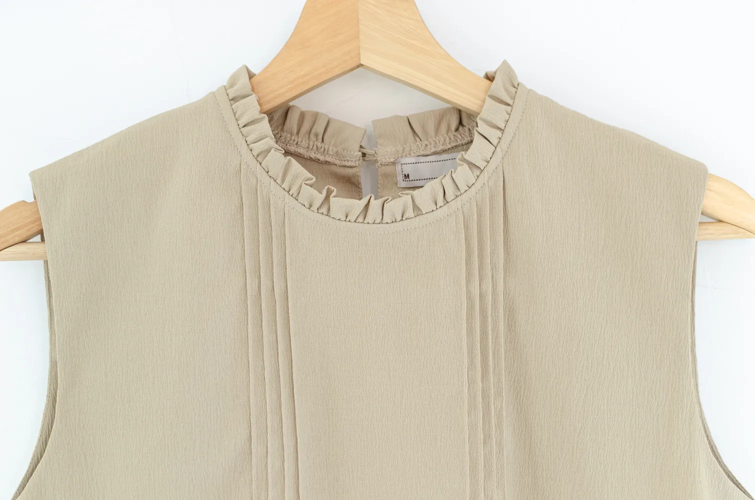 MT5700 Ruff Collar Pintuck Sleeveless Blouse – Crinkled Latte - Image 3
