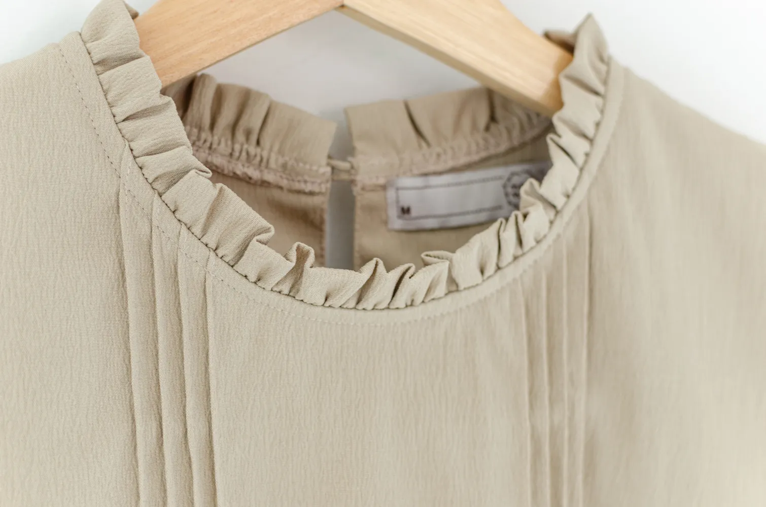 MT5700 Ruff Collar Pintuck Sleeveless Blouse – Crinkled Latte - Image 5