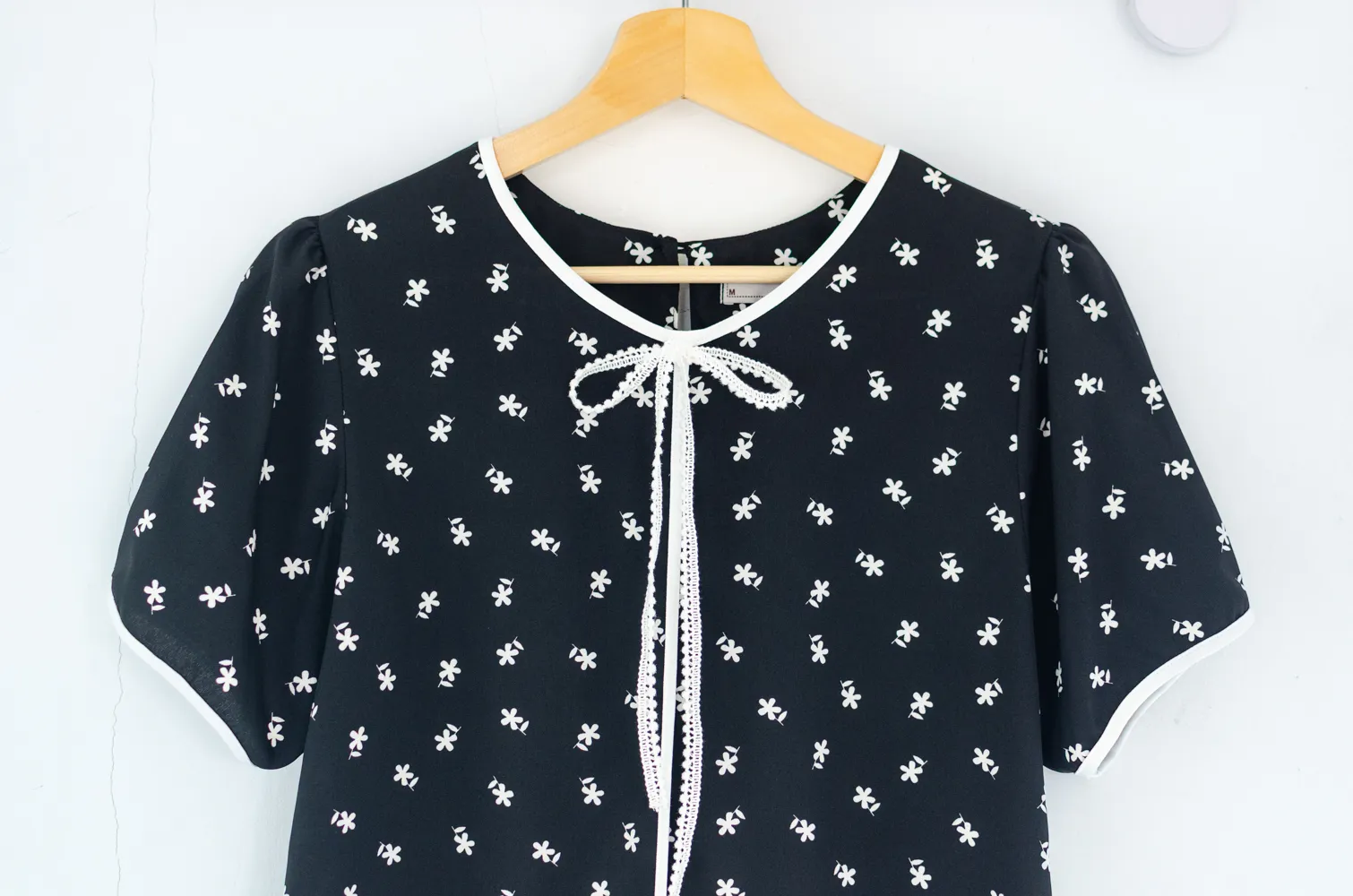 MT1556 Daisy Print Bow Blouse – Black - Image 3