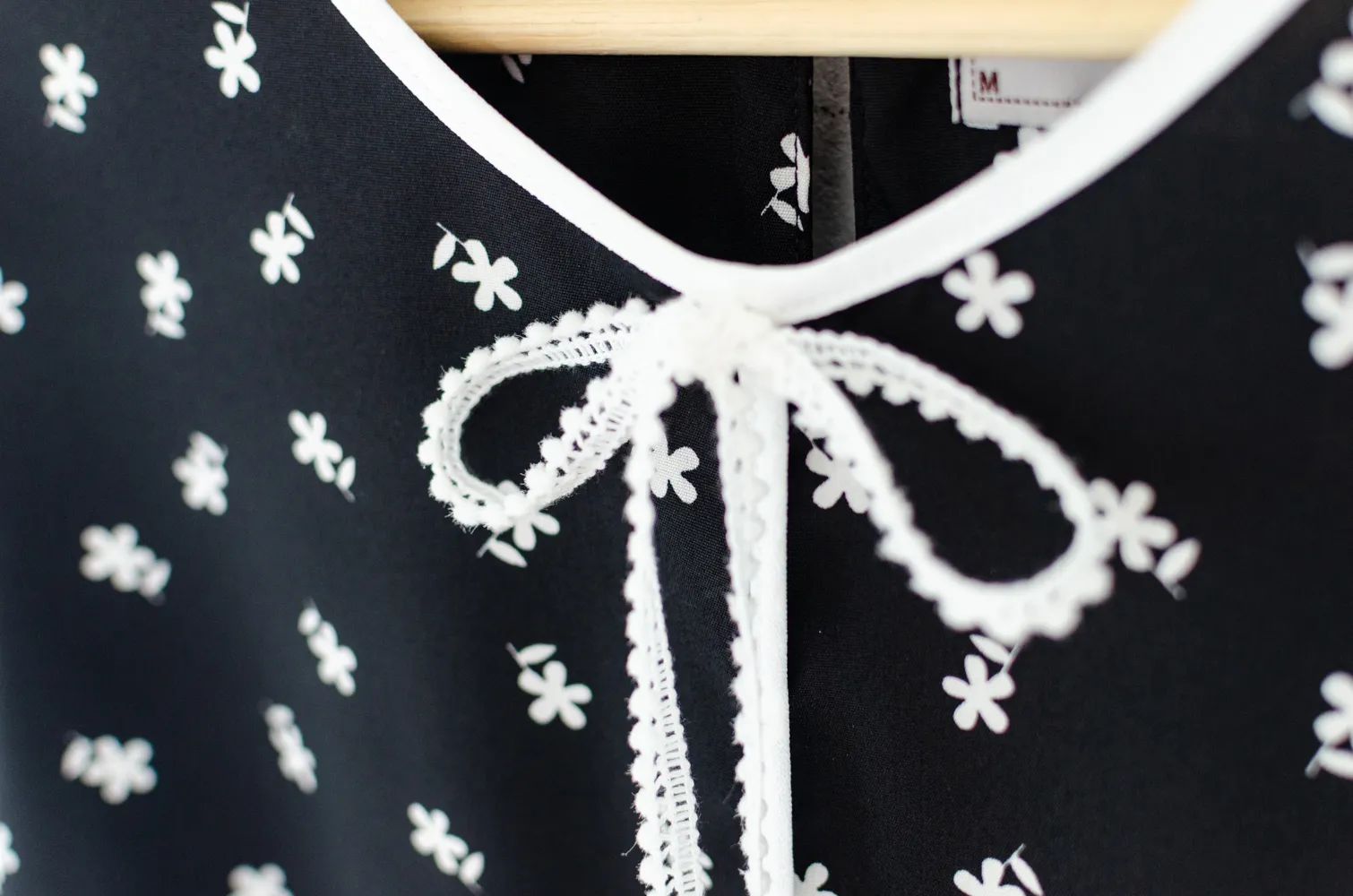 MT1556 Daisy Print Bow Blouse – Black - Image 4