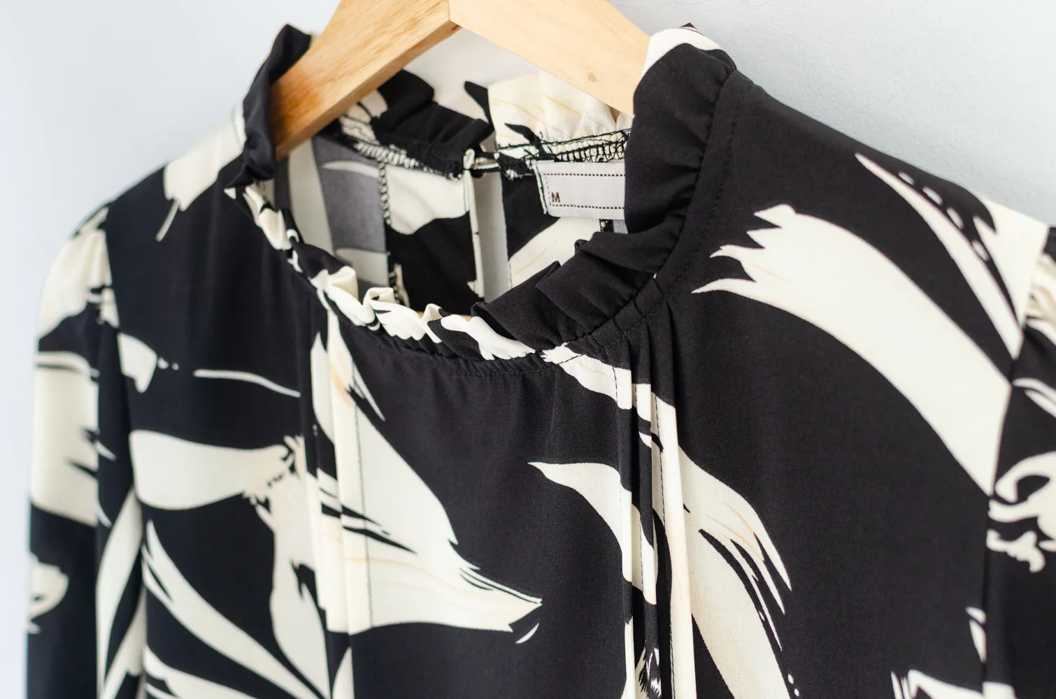 MT0431 Ruff Collar Pintuck Graphic Blouse – Black - Image 4