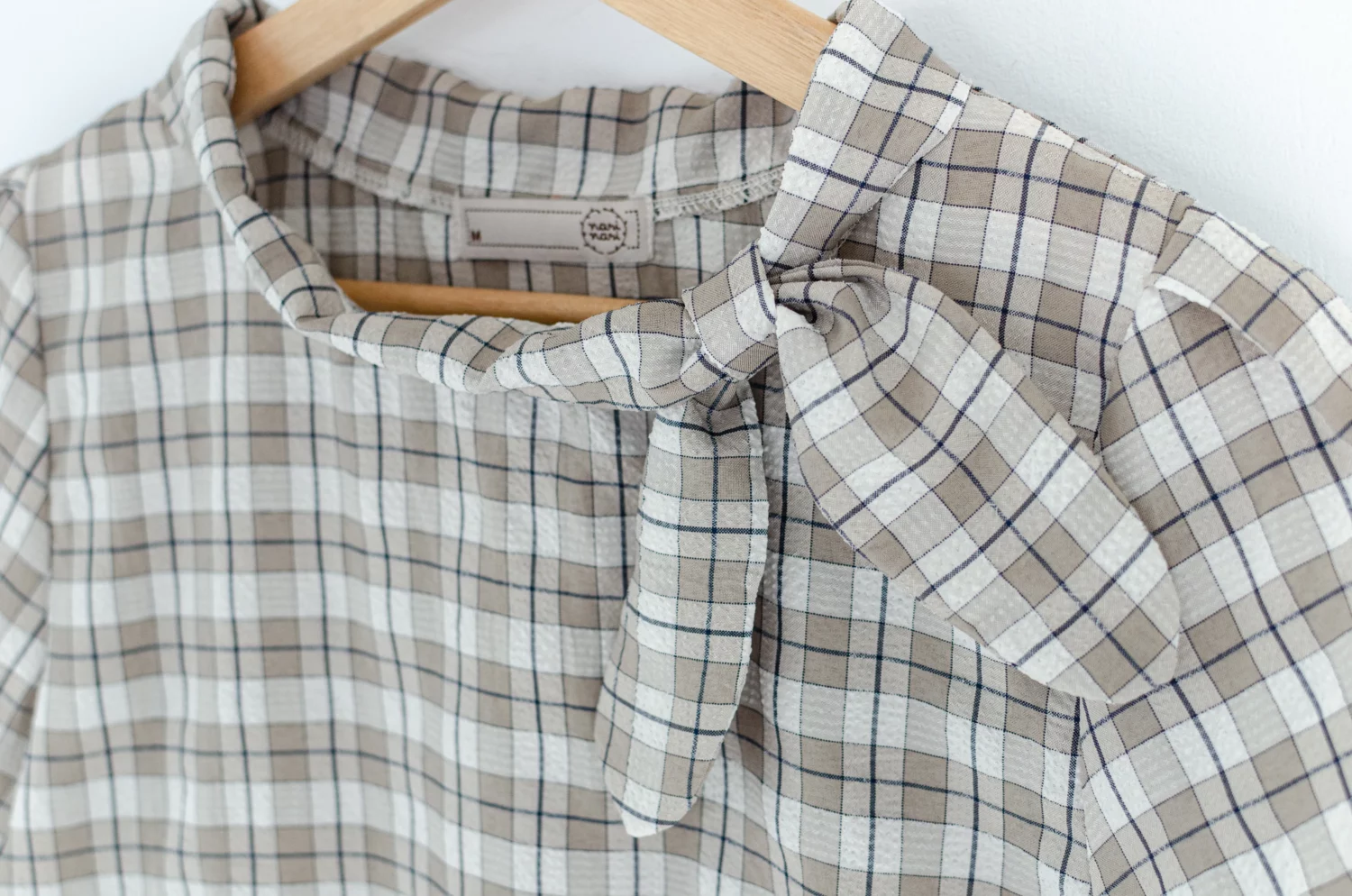 MT5139 Textured Side Checkered Bow Blouse – Taupe Brown - Image 6