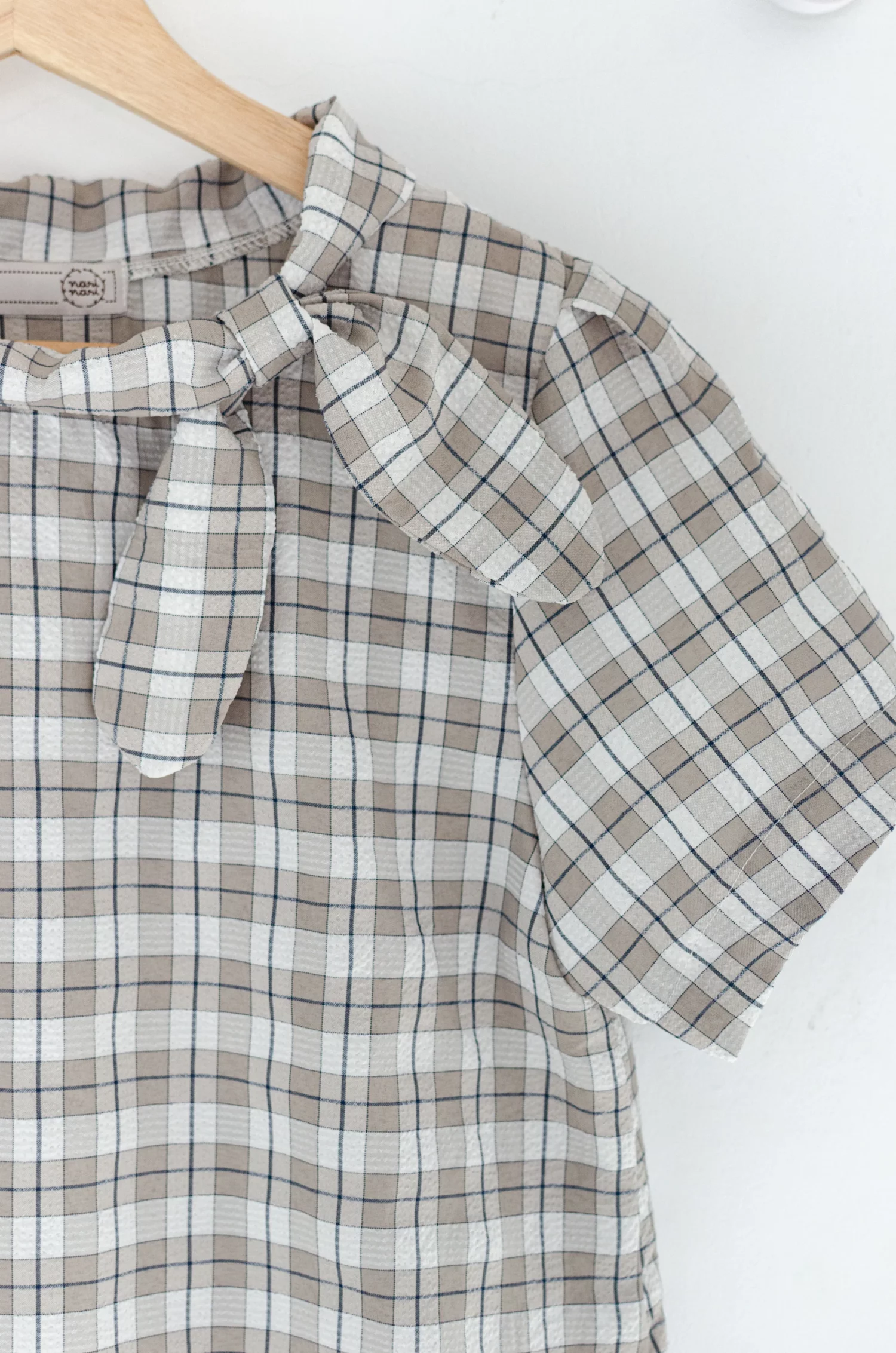 MT5139 Textured Side Checkered Bow Blouse – Taupe Brown - Image 7