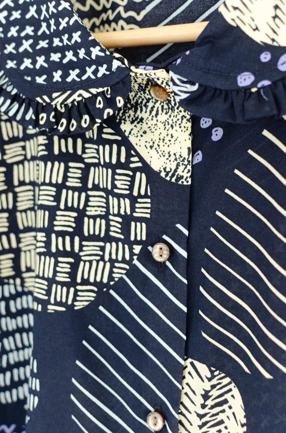 PT0260 Graphic Orb Frill & Puff Shirt – Navy Blue - Image 5
