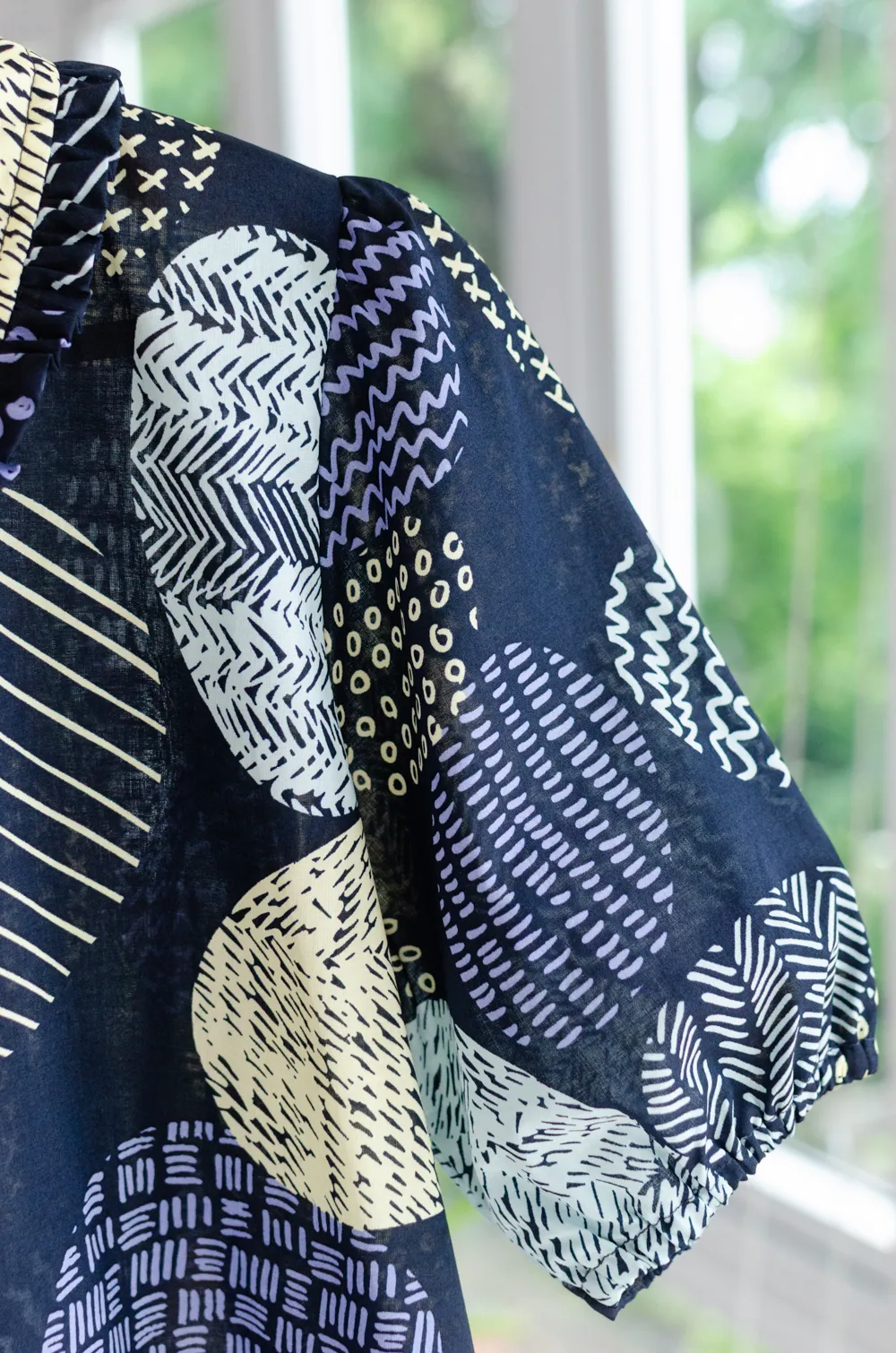 PT0260 Graphic Orb Frill & Puff Shirt – Navy Blue - Image 7
